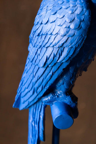 Detail shot of the parrot on the perch on the Bold Blue Parrot Floor Lamp with Shade.