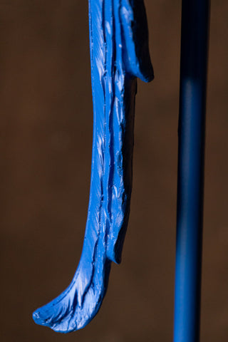 Detail shot of the parrot's feathers on the Bold Blue Parrot Floor Lamp with Shade.