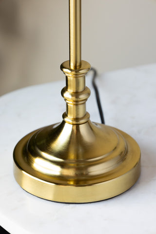 Close-up of the base of the Brass Slim Table Lamp.