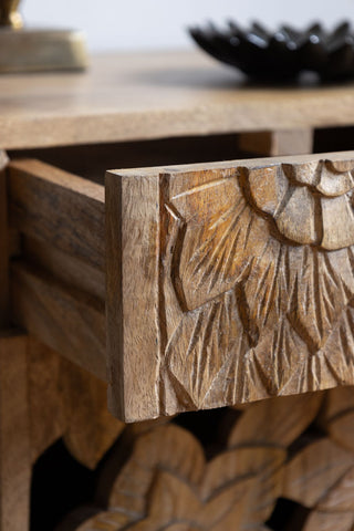 Close-up of the drawer of the Carved Floral Design Wood Bedside Table.