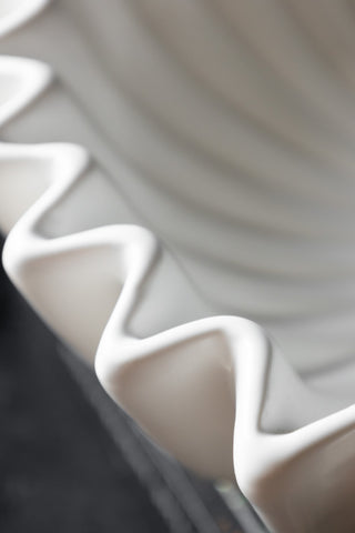 Close-up of the waved edge detail of the White Ceramic Waved Bowl.