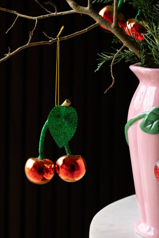 Cherries Christmas Tree Decoration hanging from branch in cherry vase