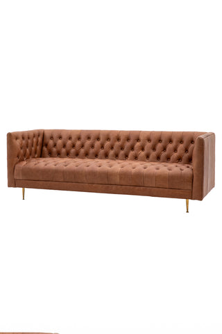 Cutout of the Chesterfield Antique Brown Leather 3-Seater Sofa seen from an angle.