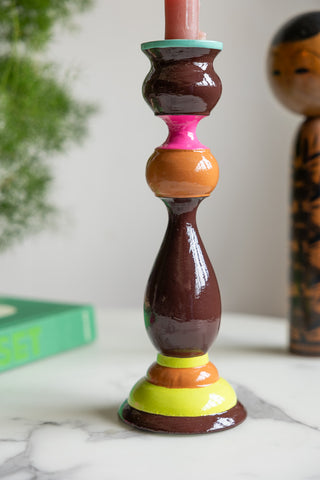 Close-up of the bottom of the Colourful Candlestick Holder in Chocolate & Orange.