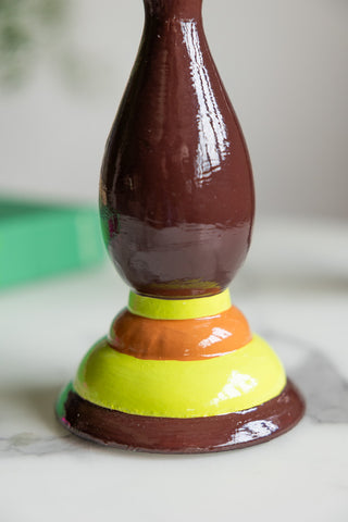 Close-up of the base of the Colourful Candlestick Holder in Chocolate & Orange.