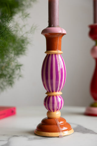 The Colourful Candlestick Holder in Pink Stripes with cold wax dripped down the side.