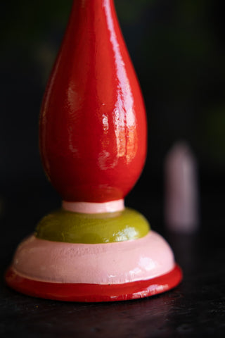 Close-up of the base of the Colourful Candlestick Holder in Red & Pink.