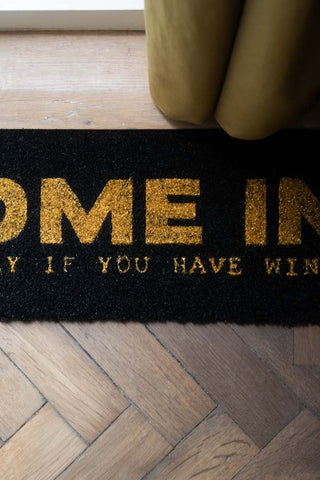 Detail shot of the Come In (But Only If You Have Wine) Coir Doormat.