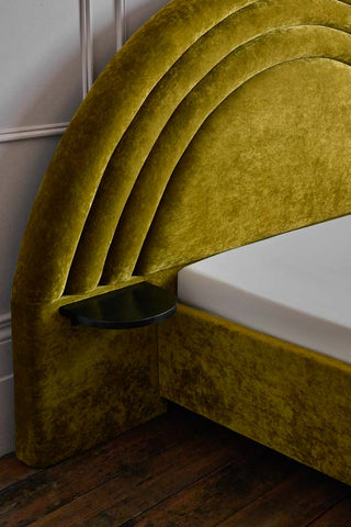 Detail shot of the built-in bedside table of the Curve Bed Green.