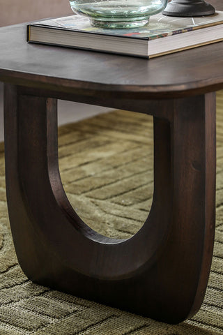 Close-up of the leg of the Curved Mango Wood Coffee Table.