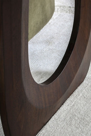 Close-up of the leg of the Curved Mango Wood Dining Table.