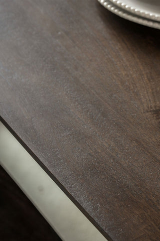 Close-up of the top of the Curved Mango Wood Dining Table.