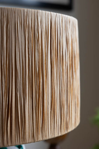 Detail shot of the shade of the Deep Green & Off White Stripe Paper Mache Table Lamp.