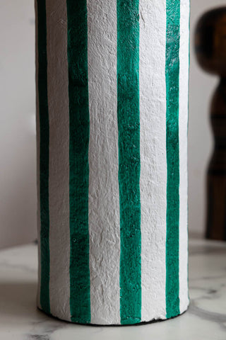 Detail shot of the bottom of the Deep Green & Off White Stripe Paper Mache Table Lamp.