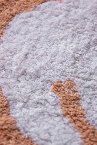 Close-up shot of the Dove Tufted Cotton Bath Mat.