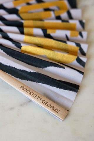 Detail shot of the Easy Tiger Print Fan with the Rockett St George logo on.