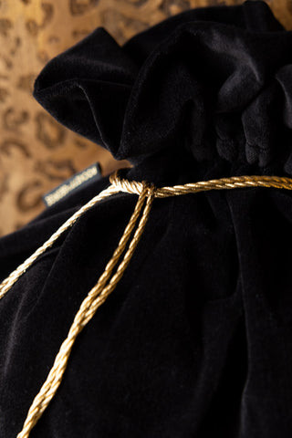 Close-up of the top and the cord tie of the Fab Yule Us Velvet Christmas Sack.