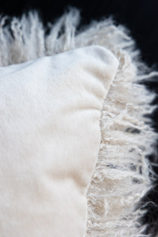 Close-up of the reverse side of the Faux Mongolian Natural Cushion.