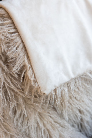 Close-up of the reverse side of the Faux Mongolian Natural Throw.