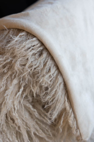 Detail shot of the reverse side of the Faux Mongolian Natural Throw.