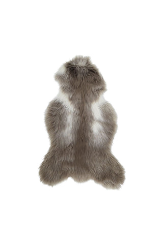 Cutout of the Faux Sheepskin Rug in White & Walnut on a white background.