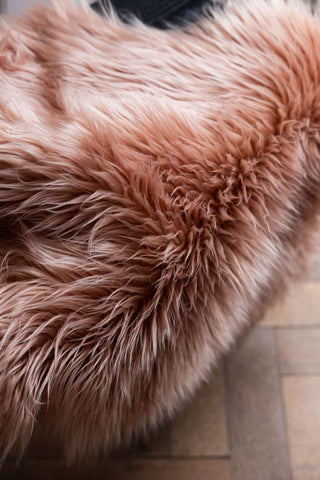 Close-up of the texture of the Faux Sheepskin in Blush.