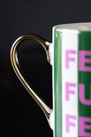 Detail shot of the handle on the Feeling Fucking Festive Stripe Mug.