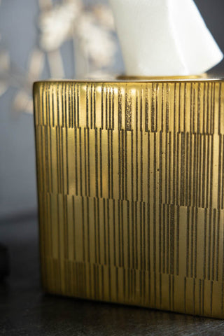 Close-up of the design on the side of the Fine Line Detail Gold Effect Tissue Box.