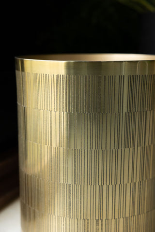 Detail shot of the side of the Fine Line Detail Gold Effect Waste Bin.