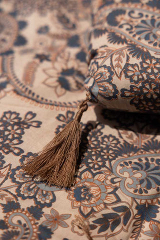 Close-up of the tassel of the Floral Paisley Bench Seat Pad.