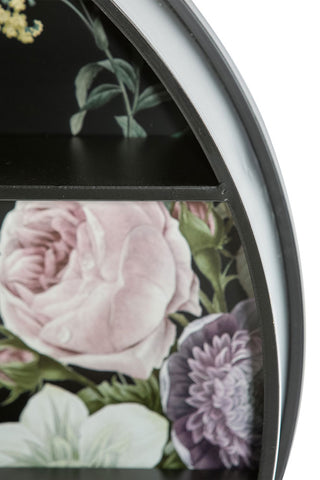 Close-up of the Floral & Black Metal Display Shelves on a white background.