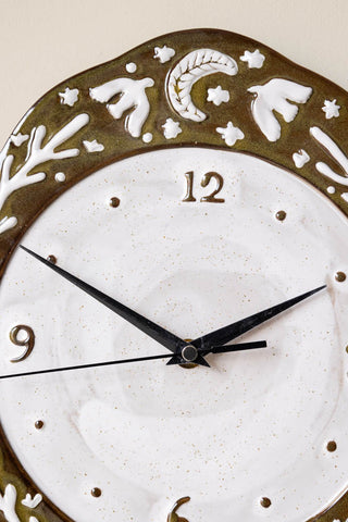 Close-up image of the Folk Birds Ceramic Clock.