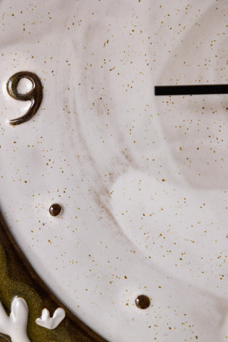 Close-up of the finish of the Folk Birds Ceramic Clock.