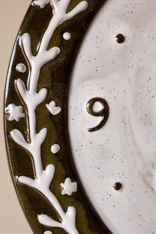 Close-up of the design of the Folk Birds Ceramic Clock.