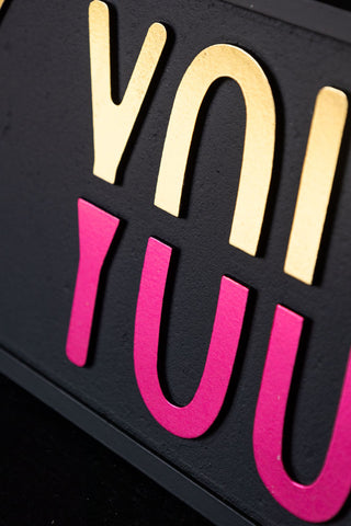 Detail shot of the Fuck vs Love You Wall Sign.