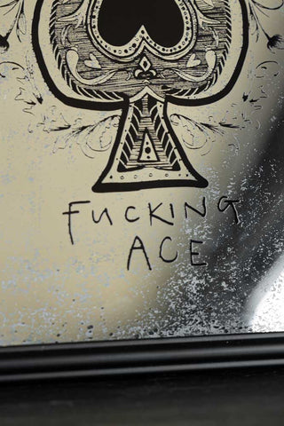 Close up of the text on the Fucking Ace Decorative Playing Card Mirror.