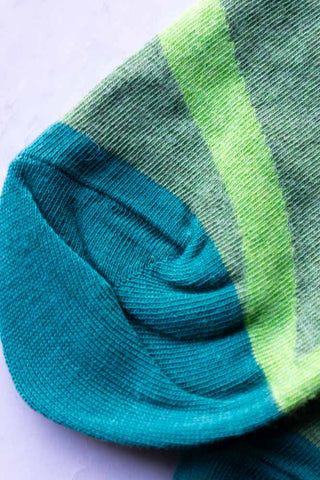 Detail shot of the bottom of the Fucking Beautiful Lawn Men's Socks.