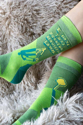 The Fucking Beautiful Lawn Men's Socks being worn by a model.