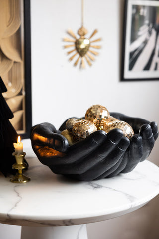 A Christmas styled Lifestyle image of the Giant Giving Hands Bowl