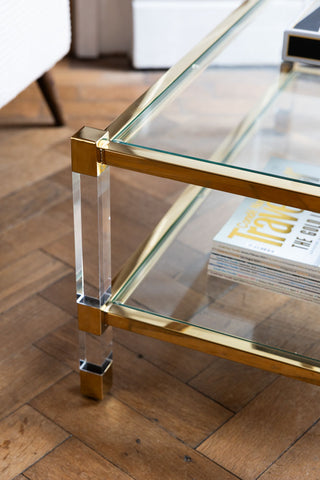 Close-up of one corner of the Gold & Glass Coffee Table.