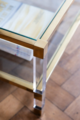 Close-up of the corner of the Gold & Glass Coffee Table, seen from above.