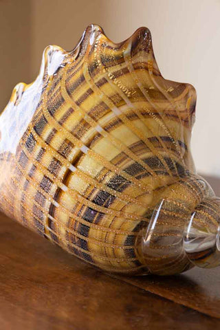 Detail shot of the Glass Conch Shell Paperweight Ornament.