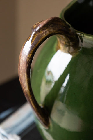 Detail shot of the handle of the Glazed Jug in Olive Green.