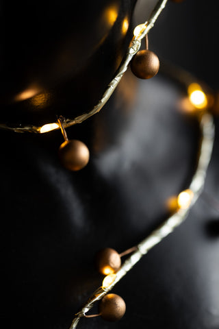 Gold Berry Decorative Light Chain wrapped around bust detal