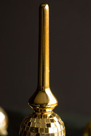 Close-up of the top of the Gold Disco Ball Christmas Tree Topper.