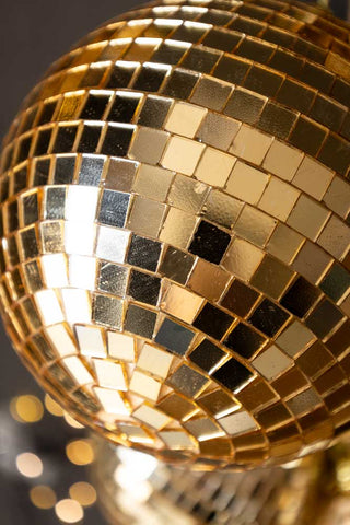 Close-up of one of the disco balls on the Gold Disco Ball Cluster Christmas Decoration.