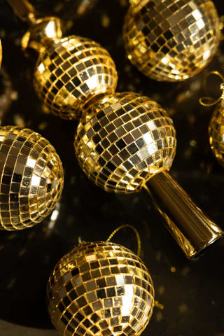 Detail image of one of the Gold Disco Ball tree topper