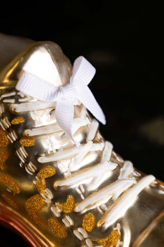 Close-up of the top of the Gold Glass Sneaker Christmas Tree Decoration.