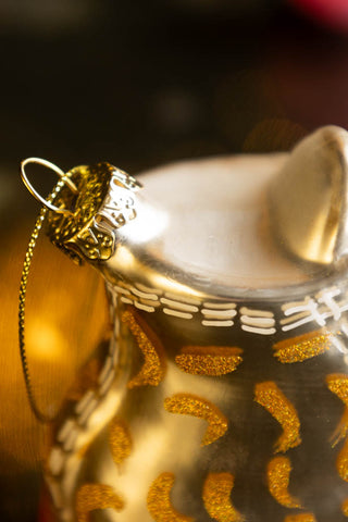 Detail shot of the top/hook of the Gold Glass Sneaker Christmas Tree Decoration.