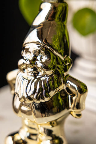 Close-up of the face of the Gold Gnome Single Stem Vase / Candlestick Holder.